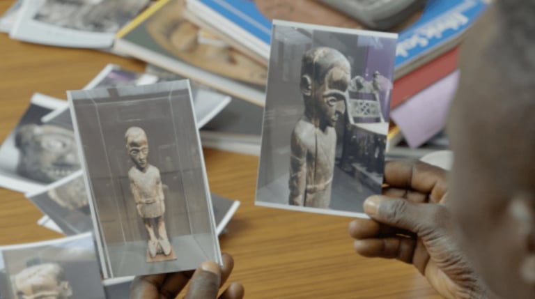 Photographs of the disputed artifact. The sculpture was made by the Pende in 1931 in an effort to control the spirit of Belgian officer Maximilien Balot, who was decapitated in an act of rebellion after committing rapes and other atrocities. Courtesy KOW Berlin