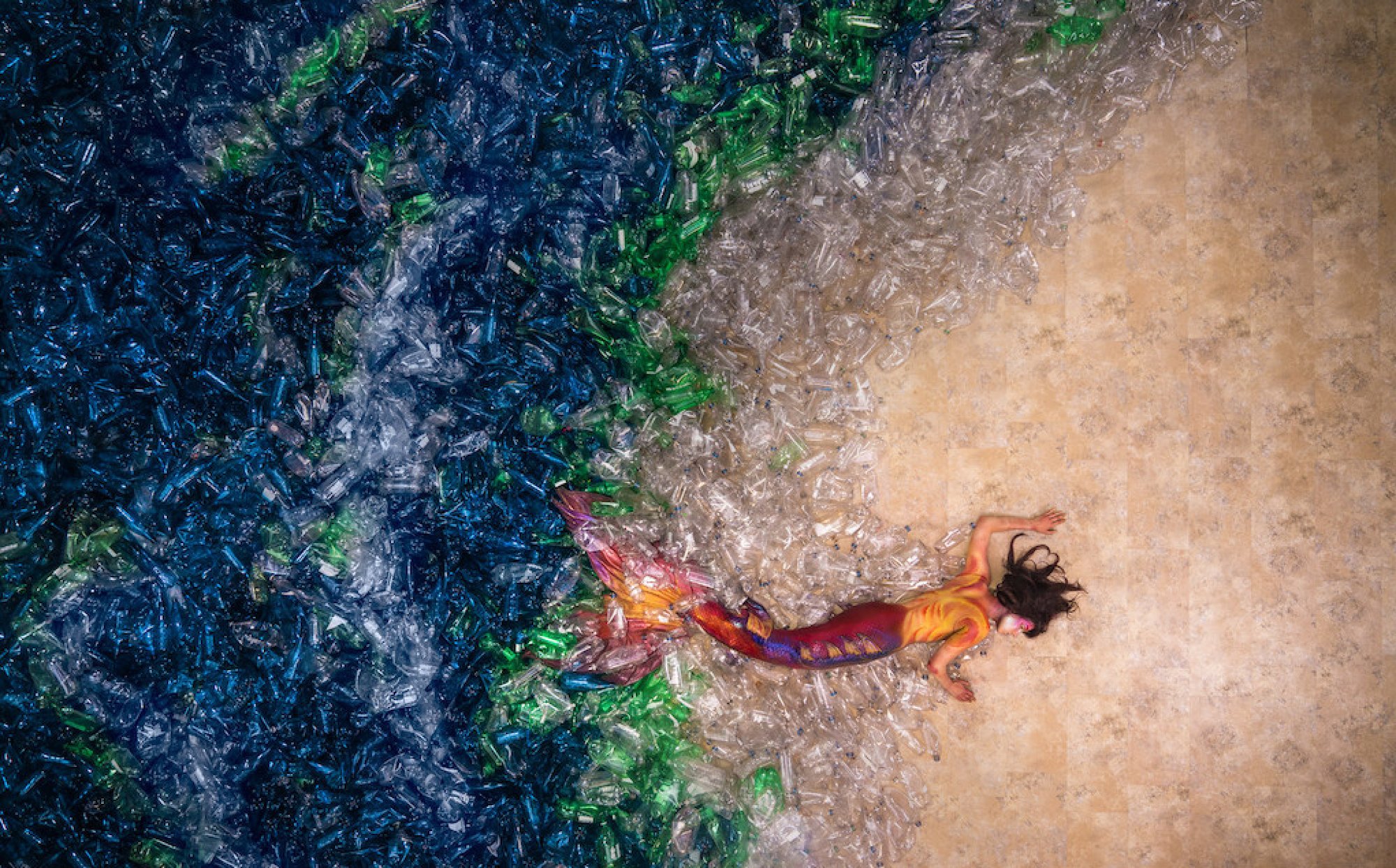 Credit: Benjamin Von Wong, Mermaids Hate Plastic, 2016. Courtesy of the artist