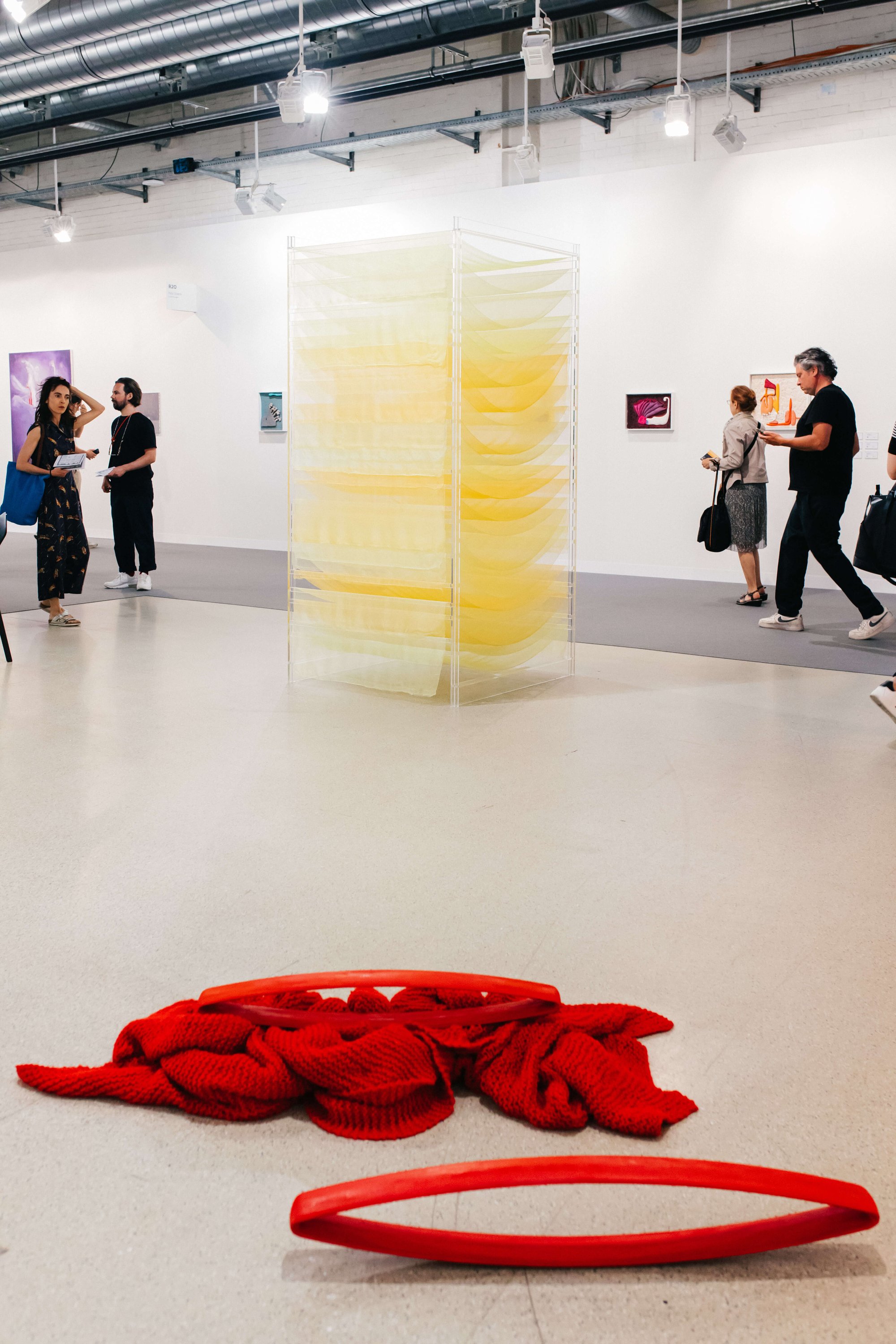 Installation view of Galleri Nils Stærk at Art Basel 2023 with works: Tove Storch, Untitled (2022) and Lea Porsager, mandOrla breaks Open (2023) Courtesy of the artists and Galleri Nils Stærk