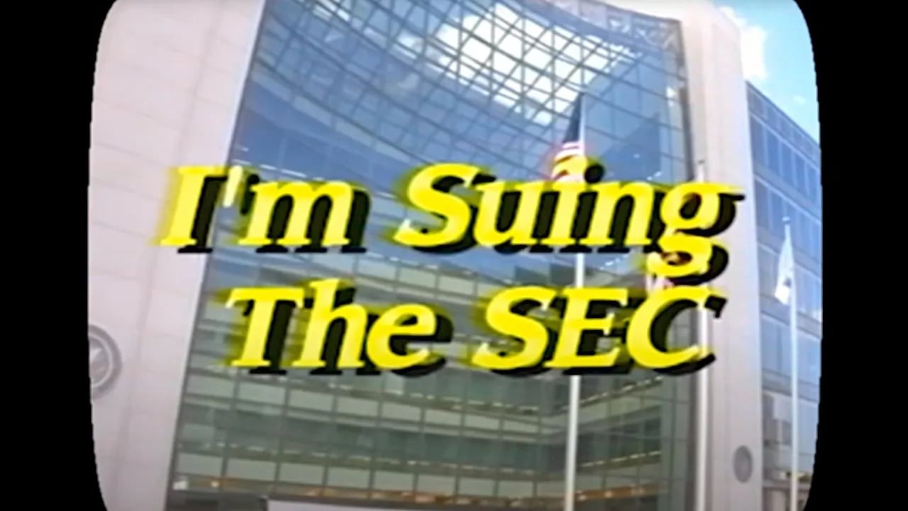 Credit: Jonathan Mann, (Still from) I’m Suing the SEC, 2024. Courtesy of the artist